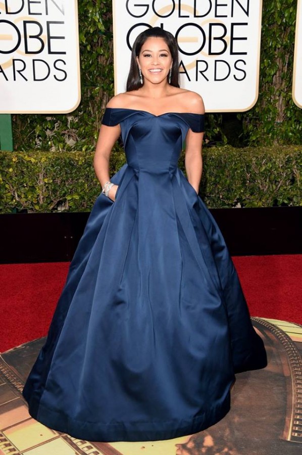 Gina Rodriguez looking regal in a midnight blue structured Zac Posen gown. Image: Jason Merritt/Getty Images via Today Show