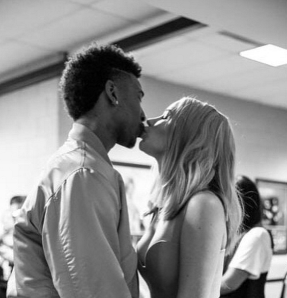 Iggy and her fiance Nick share a kiss in a photo posted on Iggy’s Instagram account. Image: Iggy Azalea via Instagram